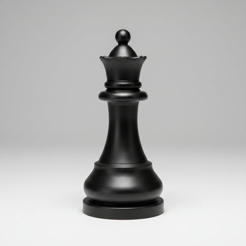 A matte black chess queen piece centered on a light gray gradient studio background.