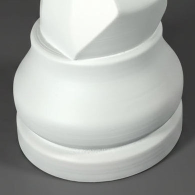 A white chess knight piece, resembling a knight on a chess board, shown from a three-quarters perspective against a dark gray gradient background.