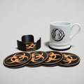 Set of coasters with biohazard symbol on agrey background.
