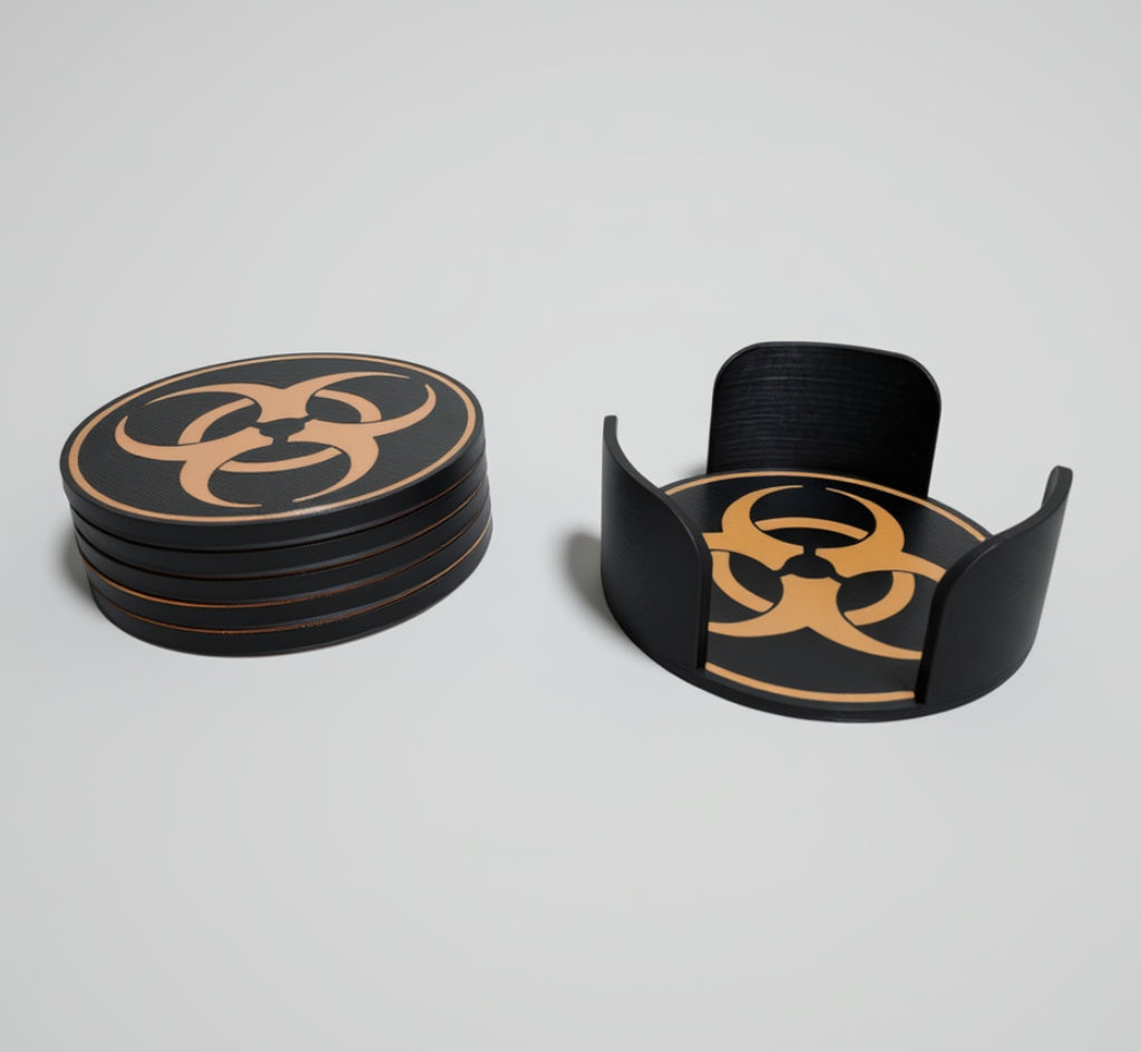 Black coasters with biohazard symbol on a grey background.