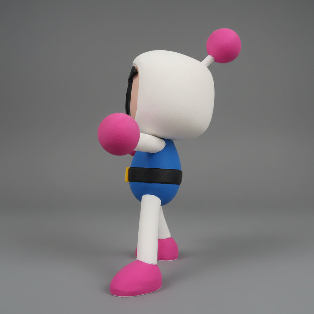 Bomberman figurine with pink shoes and a blue top on a grey background