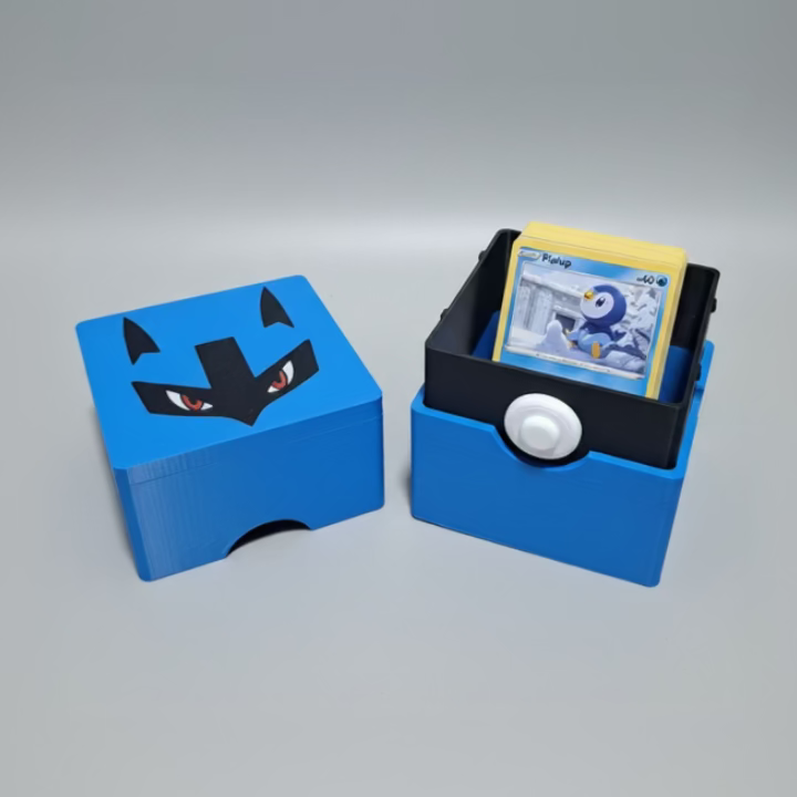 A blue and black lucario-themed card display box set on a grey background, One half of the box is closed, and the other half is open to show a card slot holding a Pokemon cards.