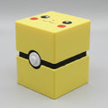 3D printed Pikachu Pokémon deck box in bright yellow with Pikachu face lid art, black Poké Ball clasp band and white button.