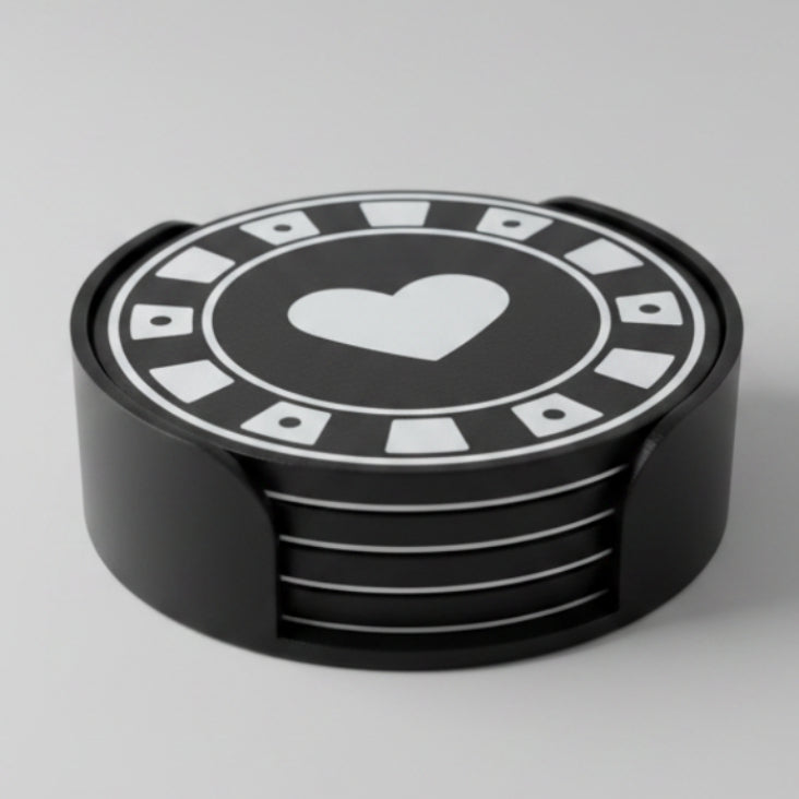 Black and white poker chip coaster set ona grey background.