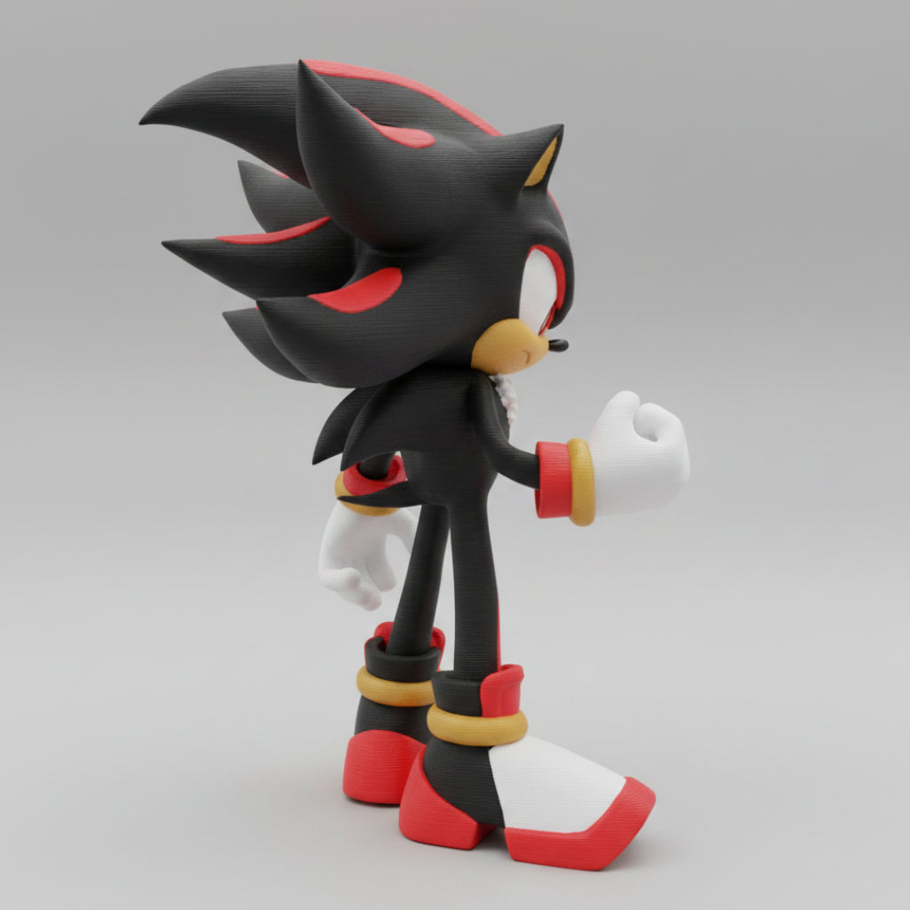 A collectible action figure of Shadow the Hedgehog, standing on a gray background.