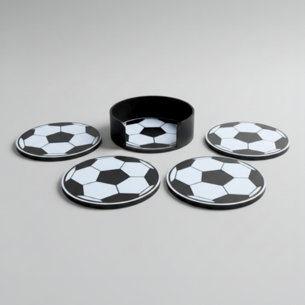 3D printed football coaster set — 4 cork-backed soccer ball coasters arranged around black holder, handmade by FredBox3D Ireland

