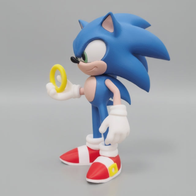 Side view sonic holding a yellow ring on a grey background