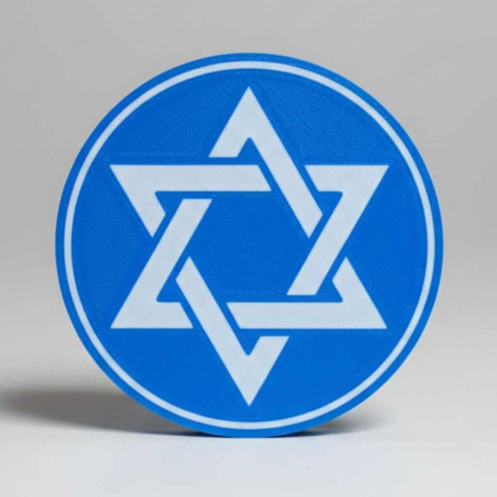 Blue coasters with a Star of David design on a grey surface.