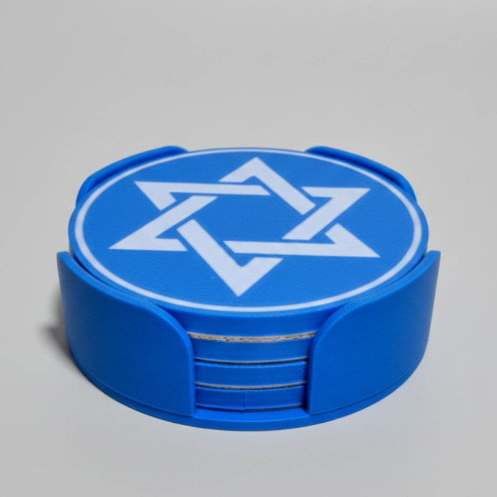 Blue coaster set with Star of David design on a grey surface.