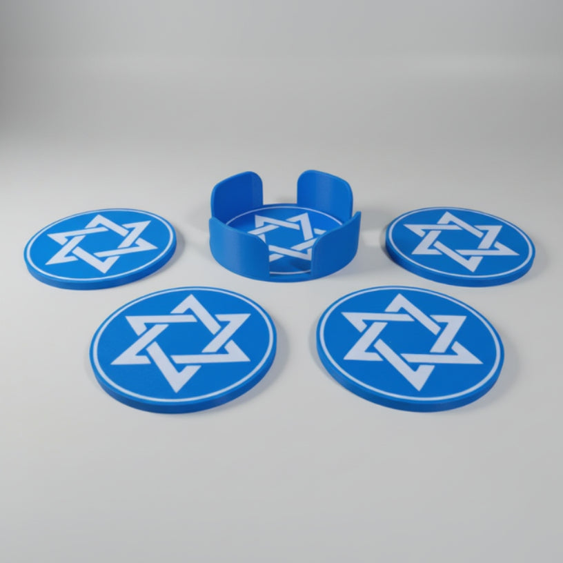 Blue coasters with Star of David design on a grey surface.