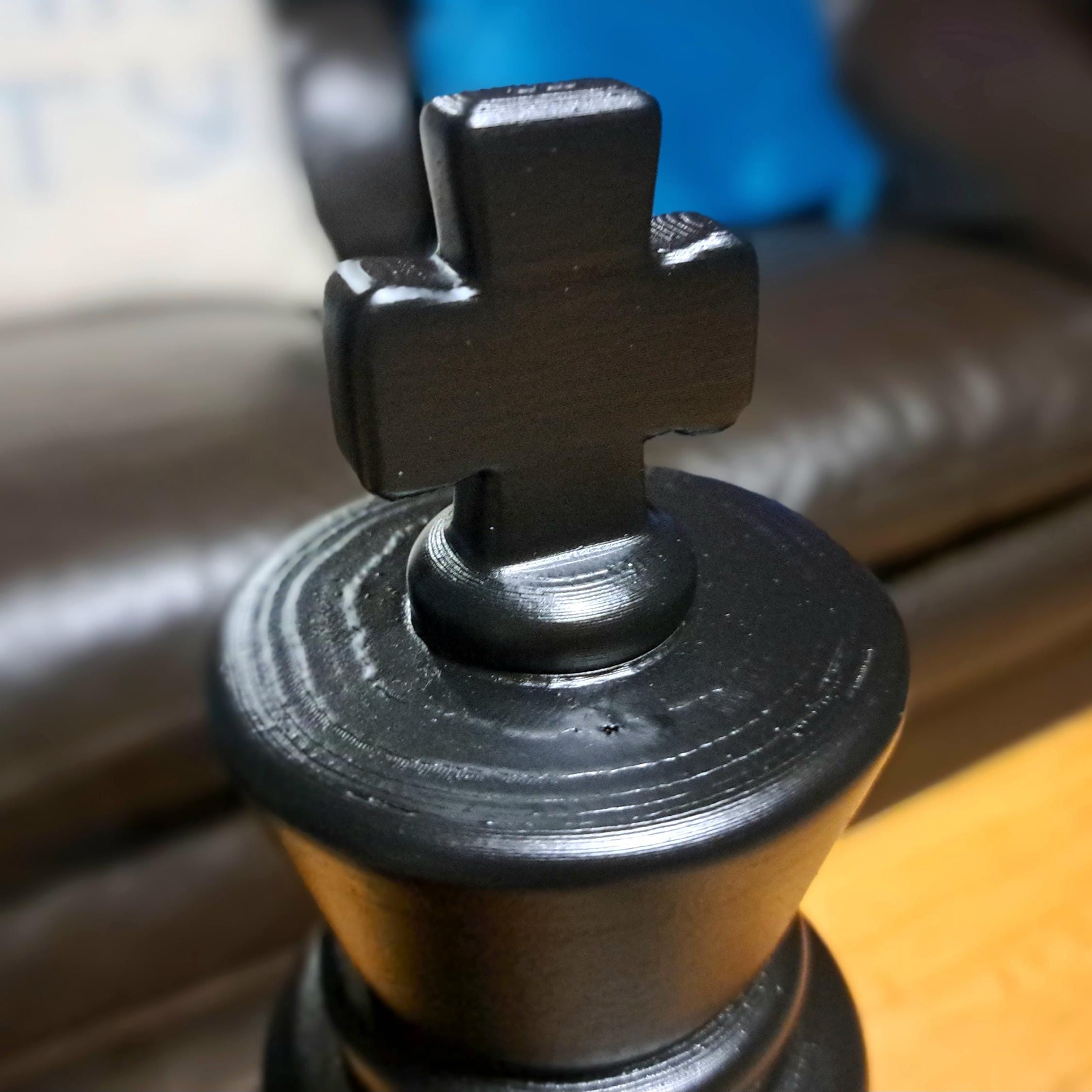 Close up of a large black king chess piece